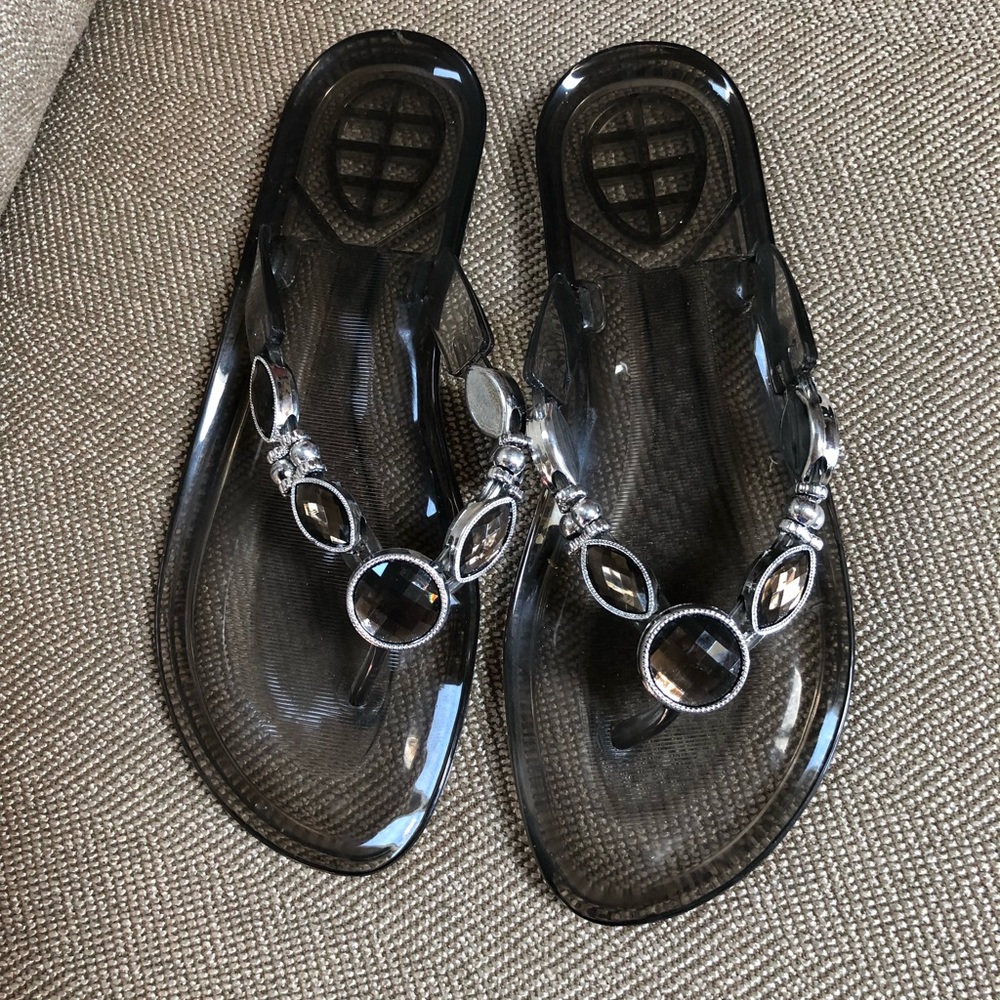 Unworn black and silver jelly sandals